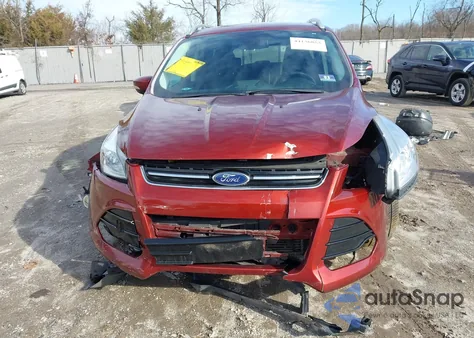 2015 Ford Escape Titanium z USA, uszkodzony, nr VIN 1FMCU9J96FUC85139